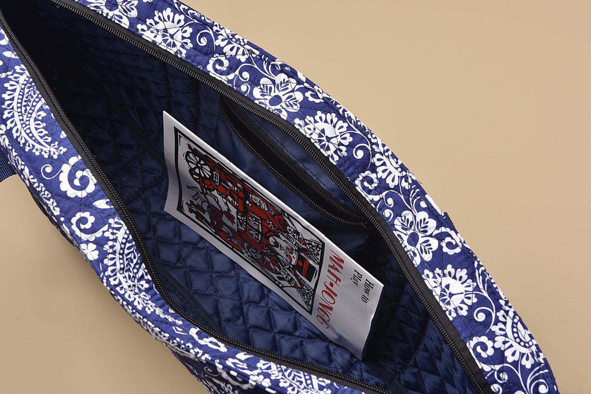 Inside the bag with zip pocket and booklet