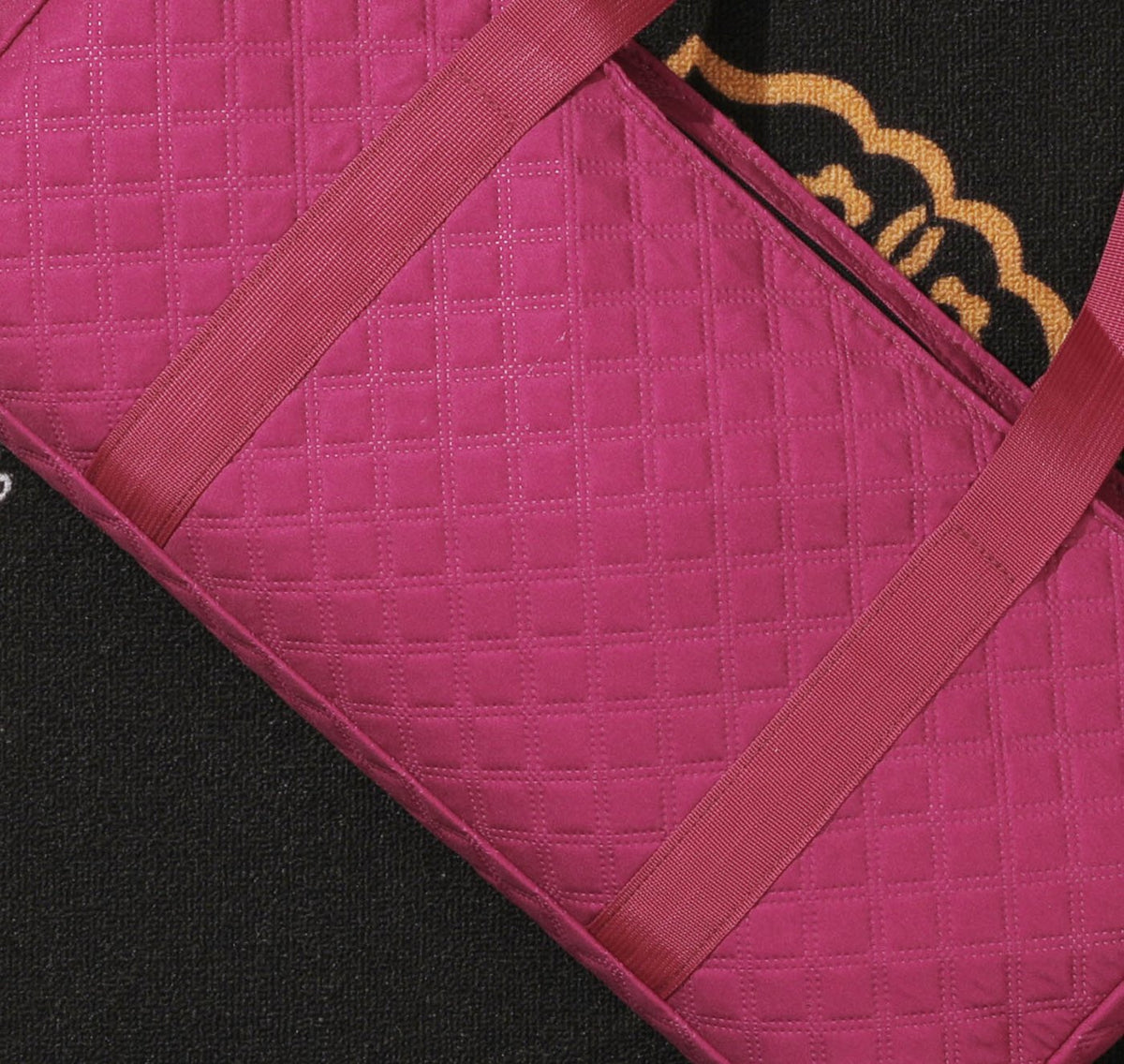 Close-up of the burgundy quilting