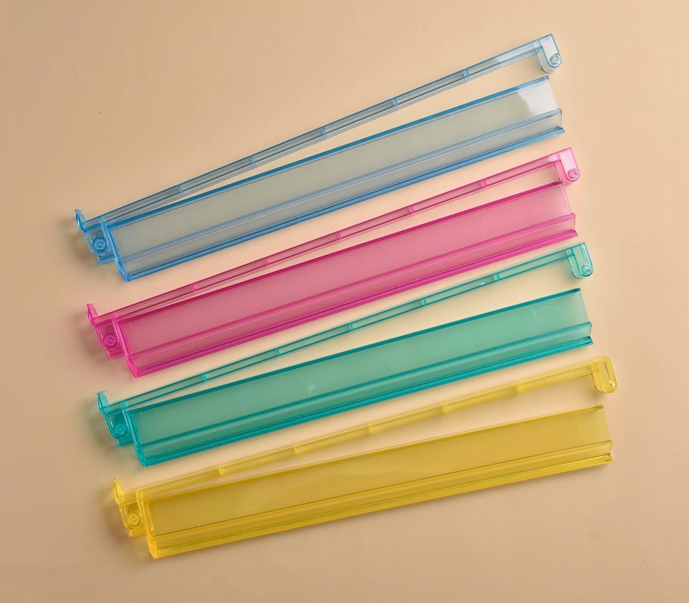 Four rainbow 2-in-1 mahjong racks in blue, pink, teal and yellow
