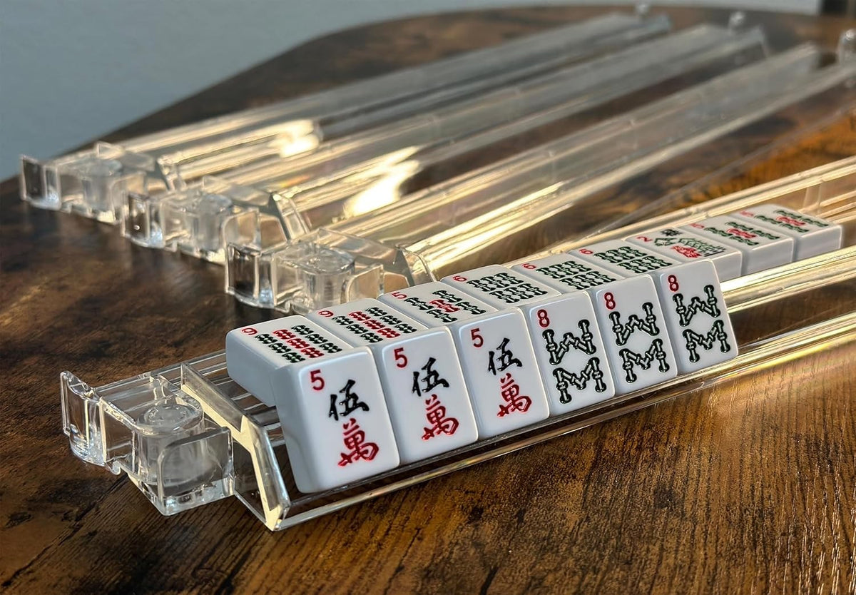 Clear racks holding a row of tiles