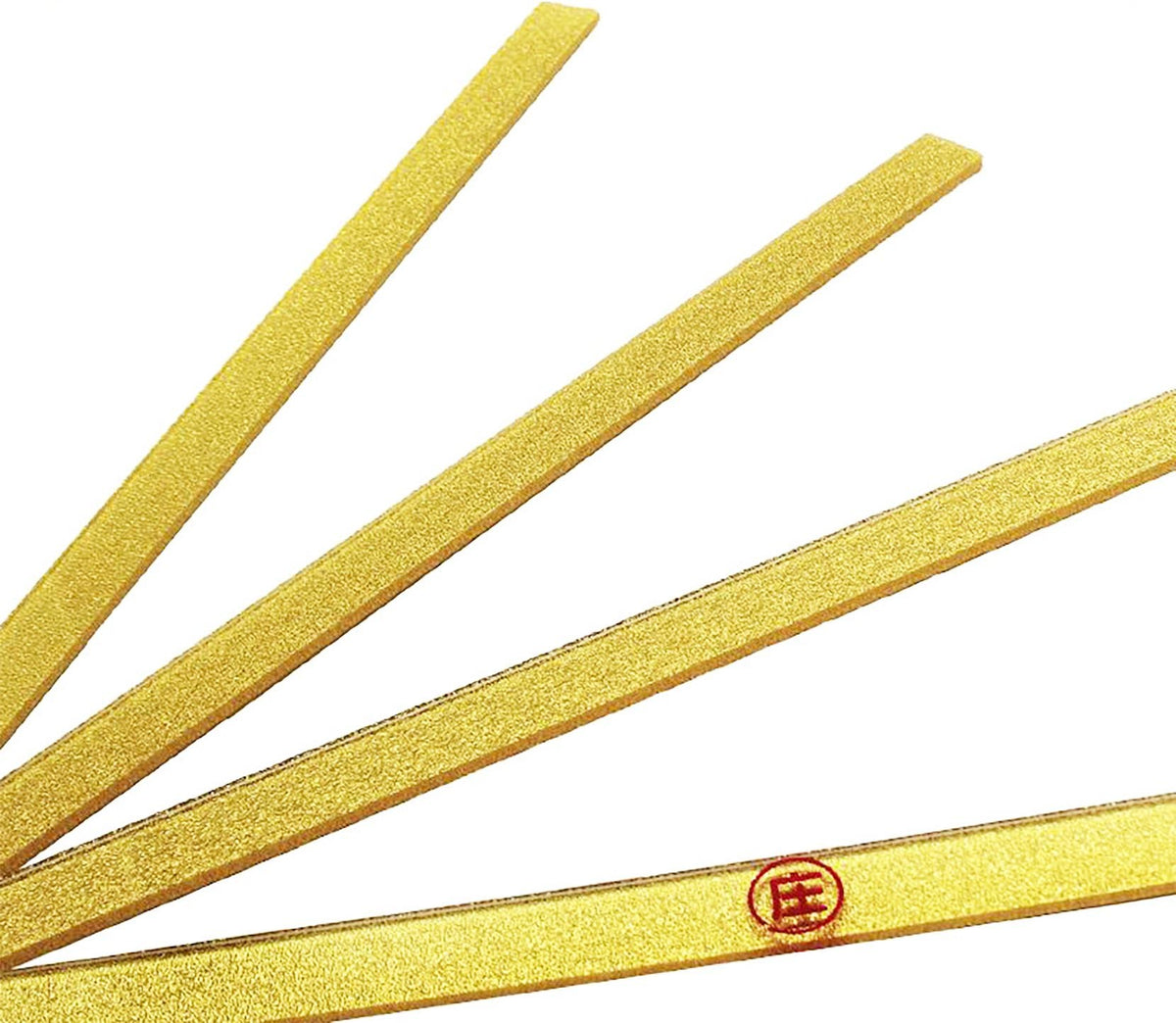 Close-up of the gold glitter finish and the red dealer mark