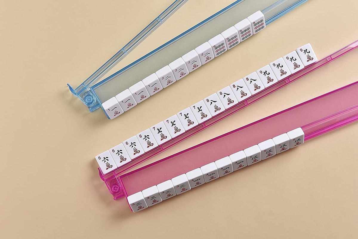 Tiles lined up on the blue and pink racks